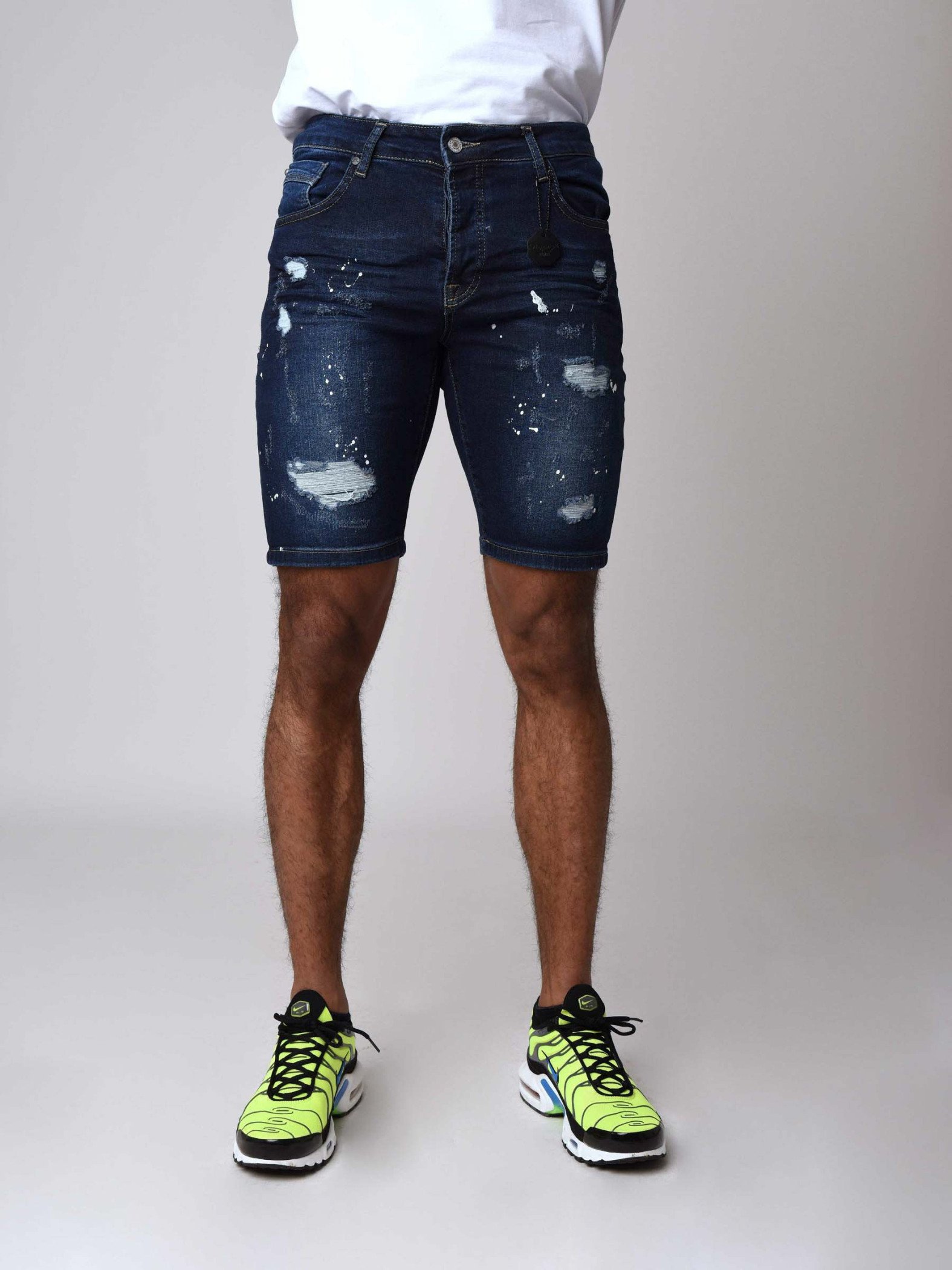 Short en jean skinny bleu foncé effet déchiré et tacheté Homme Project