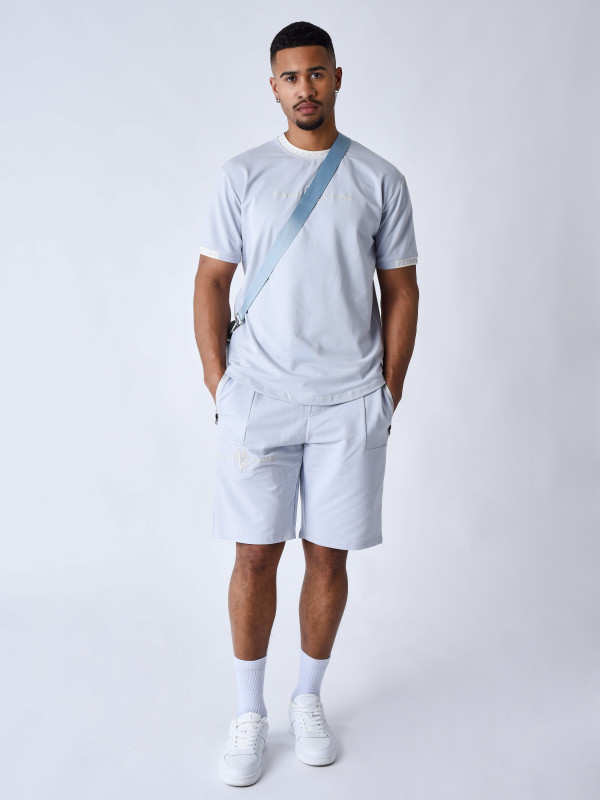 Einfarbige Shorts mit Logo-Streifen - Gletscherblau