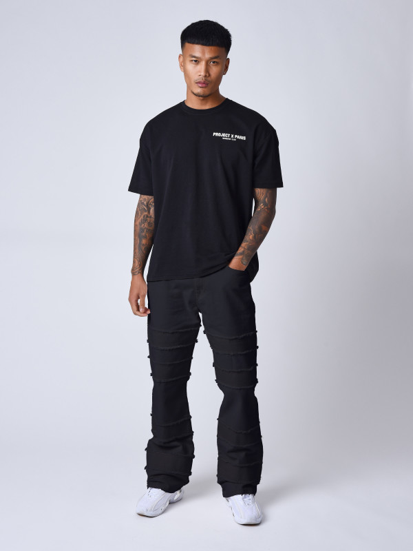 Jeans ausgestellt mit ausgefransten Details - Schwarz